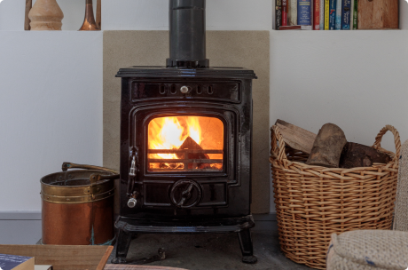 Cozy fireplace with burning logs