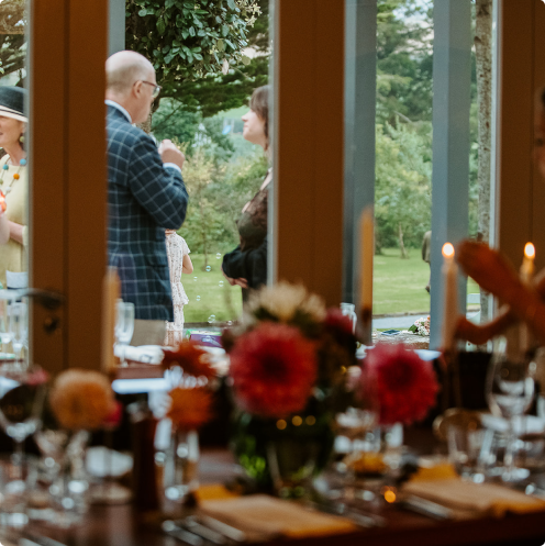 Social gathering with dinner setting.