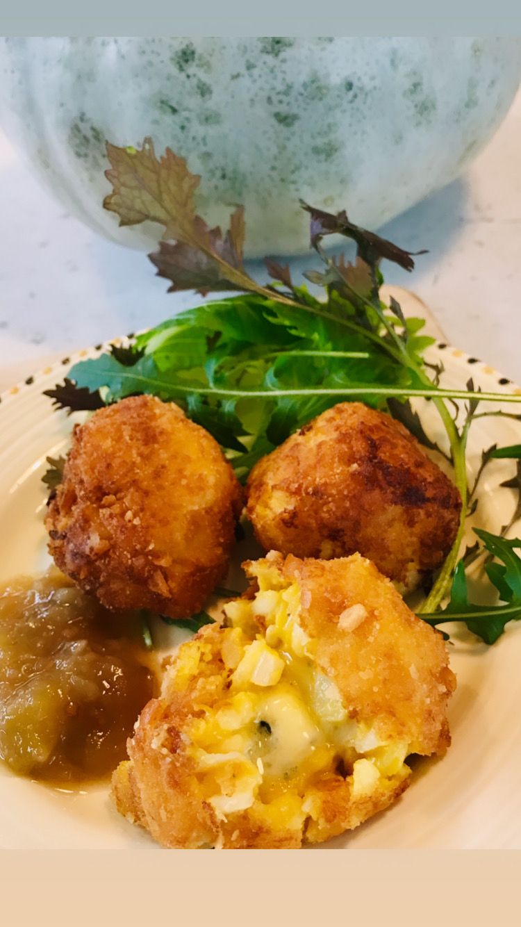 Arancini on a plate.
