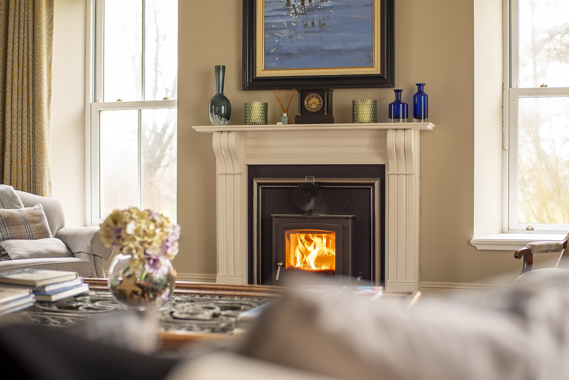 Stove lit in a house.