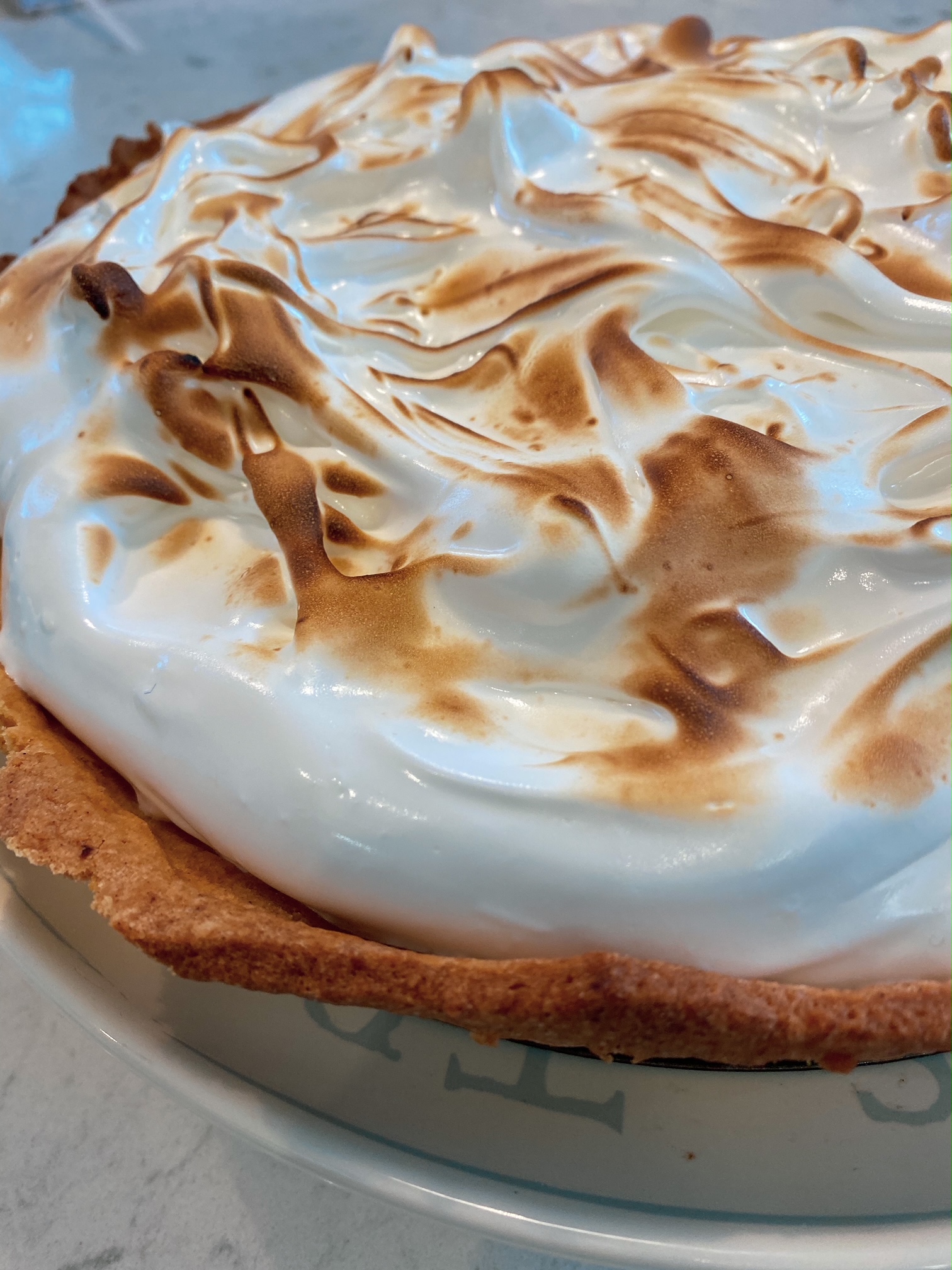 Lemon Meringue Pie Close up on a plate.