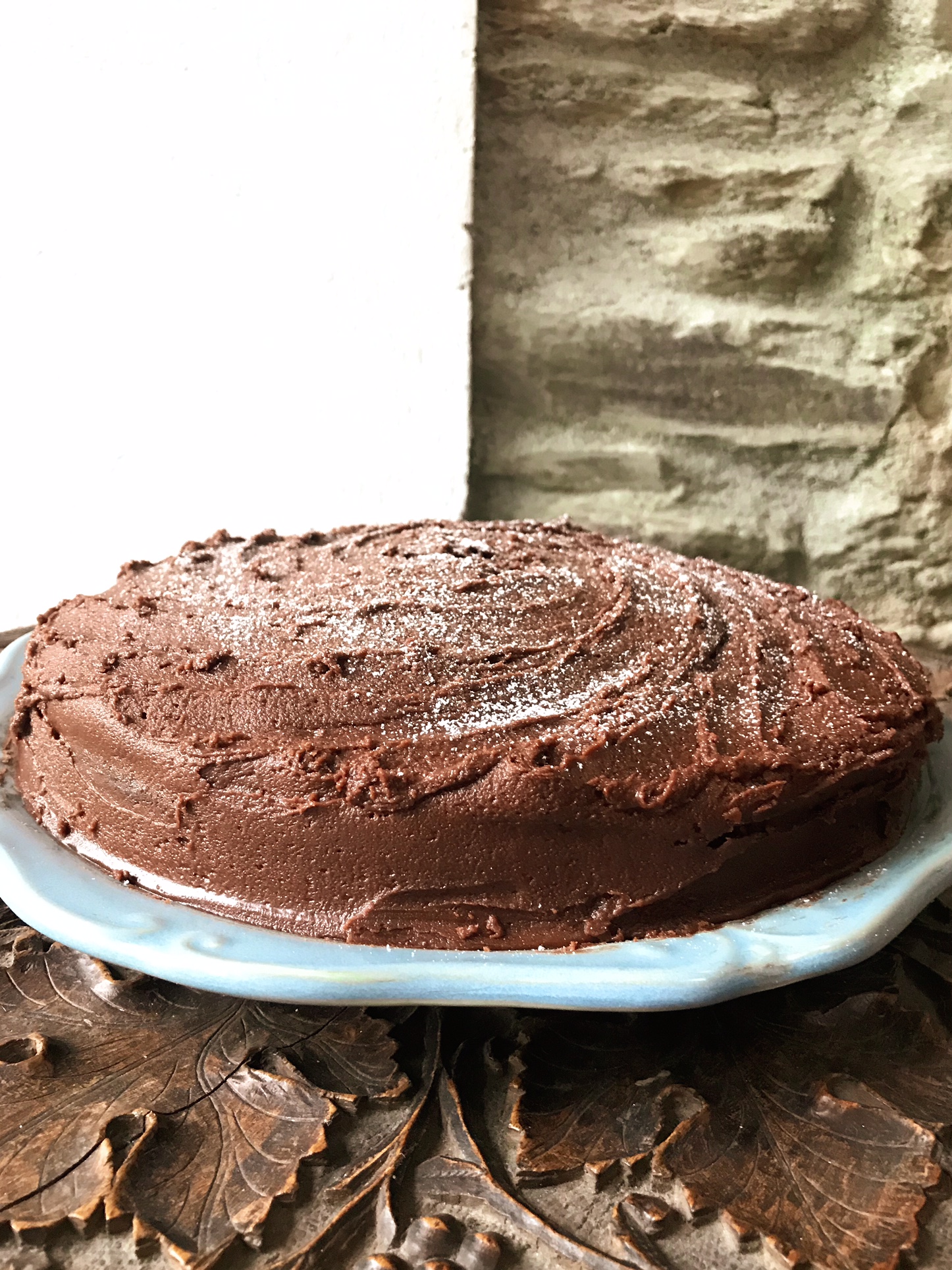 Chocolate coca cola cake on a plate.
