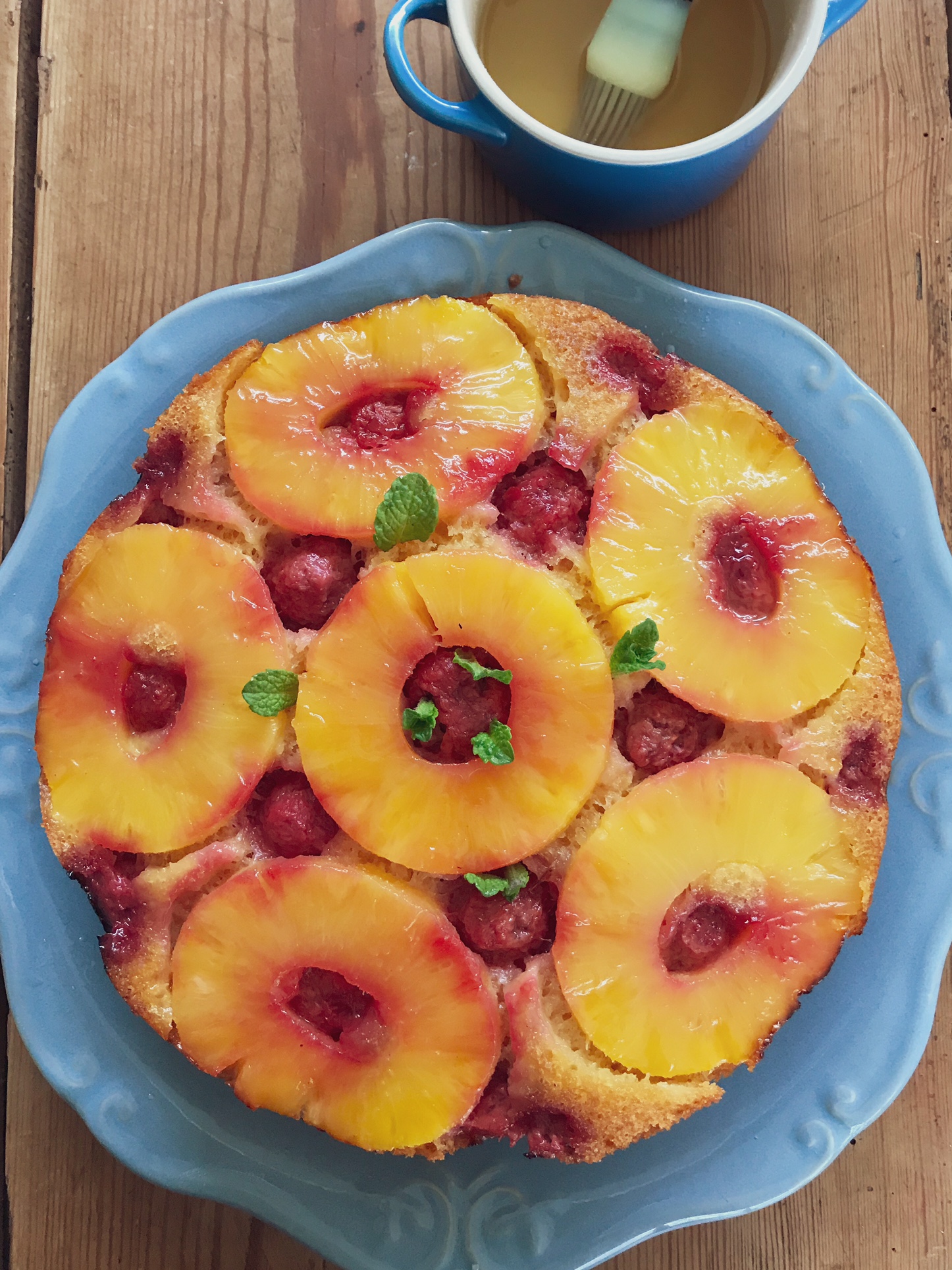 Pineapple upside down cake on a plate.