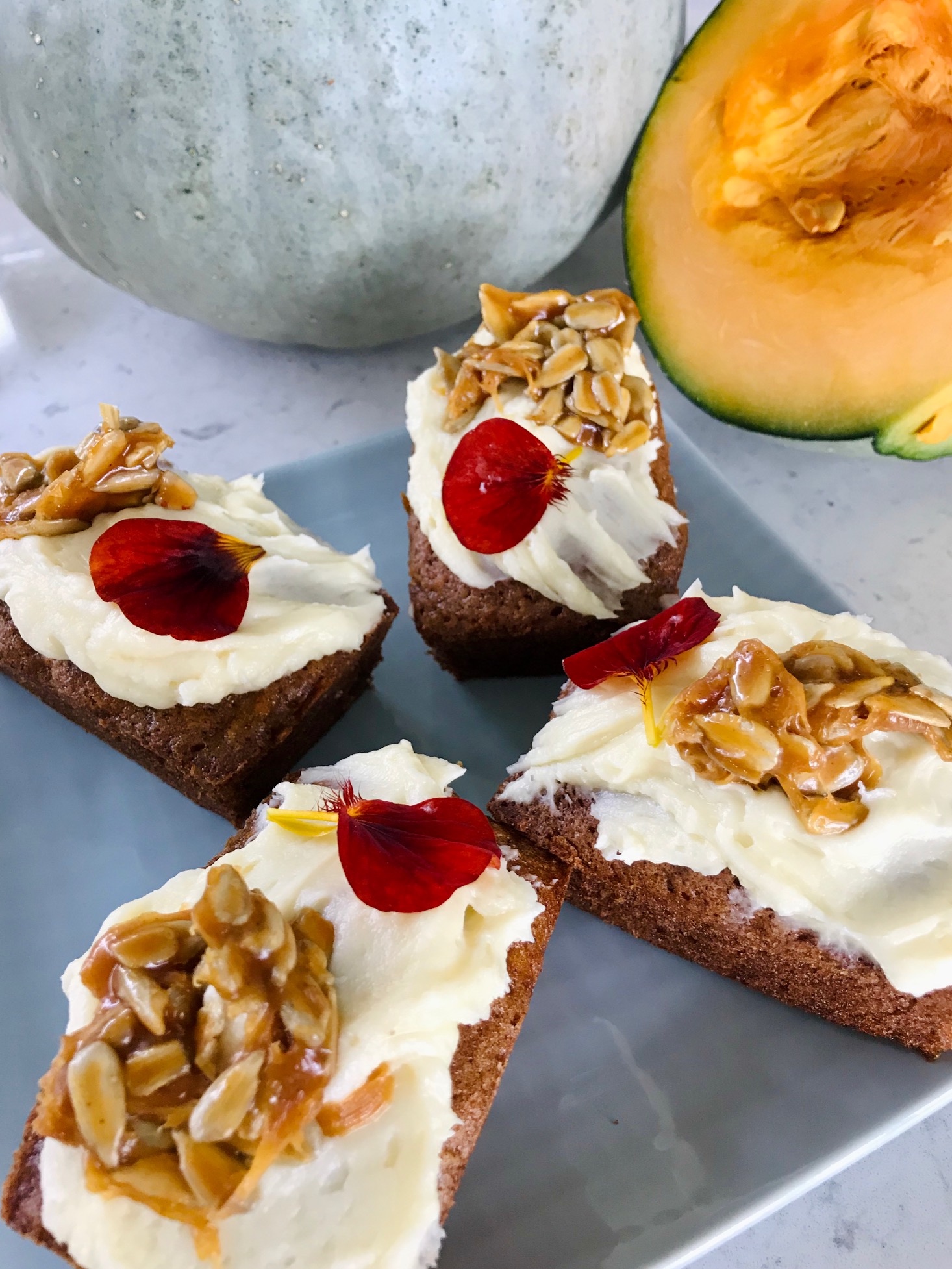 Sticky toffee pumpking pudding cake on a plate.